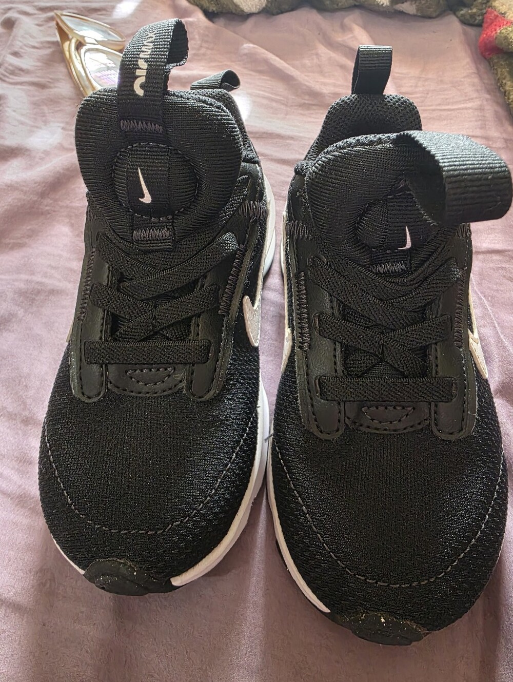Nike Kids Black Sneakers with White Sole and Small Pink Swoosh